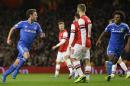 Chelsea's Mata celebrates scoring against Arsenal during their English League Cup fourth round soccer match at Emirates Stadium in London