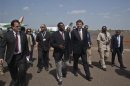 Koenders, United Nations special envoy for Mali, is greeted by Mali's foreign affairs General Secretary Cisse upon his arrival at Bamako airport
