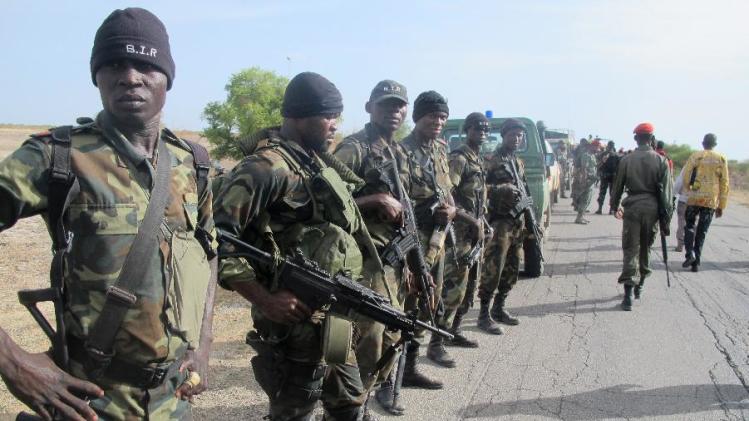 This photo taken on June 17, 2014 in Dabanga, northern Cameroon, shows Cameroon's army soldiers deploying as part of a reinforcement of its military forces against Nigerian Islamist group Boko Haram