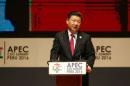 China's President Xi Jinping addresses audience during a meeting of the APEC (Asia-Pacific Economic Cooperation) Ceo Summit in Lima