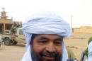 Ansar Dine Islamist group leader Iyad Ag Ghaly, answers journalists' question on August 7, 2012 at the Kidal airport, in northern Mali