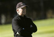 Bill Gross looks on while playing golf at Pebble Golf Links before the start of the PGA Tour Pebble Beach National Pro-Am in Pebble Beach, California February 8, 2012. REUTERS/Robert Galbraith