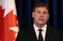 Canadian Foreign Minister John Baird holds a press conference on September 4, 2014, during an official visit in Arbil, Iraq