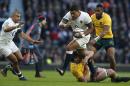 England's Nathan Hughes charges forward during the rugby union international between England and Australia at Twickenham stadium in London, Saturday, Dec. 3, 2016. (AP Photo/Alastair Grant)
