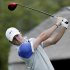 Rory McIlroy, of Northern Ireland, watches his tee shot on the 1st hole during the final round of the Texas Open golf tournament, Sunday  April 7, 2013, in San Antonio.  (AP Photo/Eric Gay)
