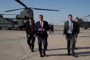 US Defence Secretary Ashton Carter (C) arrives at Baghdad's international airport from the Green Zone with his Chief of Staff Eric Rosenbach (R), to talk to troops on July 23, 2015