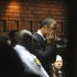 Athlete Oscar Pistorius weeps in court in Pretoria, South Africa, Friday, Feb 15, 2013, at his bail hearing in the murder case of his girlfriend Reeva Steenkamp.   Oscar Pistorius arrived at a courthouse Friday, for his bail hearing in the murder case of his girlfriend as South Africans braced themselves for the latest development in a story that has stunned the country. The Paralympic superstar was earlier seen leaving a police station in a dark suit with a charcoal gray jacket covering his head as he got into a police vehicle. Model Reeva Steenkamp was shot and killed at Pistorius' upmarket home in an eastern suburb of the South African capital in the predawn hours of Thursday. (AP Photo/Antione de Ras - Independent Newspapers Ltd South Africa) SOUTH AFRICA OUT