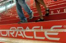 Attendees walk down branded steps at the 29th Oracle OpenWorld in San Francisco