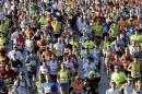 Runners participate in the Chicago Marathon in Chicago, Sunday, Oct. 13, 2013. (AP Photo/Nam Y. Huh)