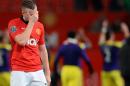 Manchester United's English midfielder Tom Cleverley reacts after a football match in Manchester, England, on January 5, 2014