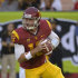 In this photo taken, Oct. 20, 2012, Southern California quarterback Max Wittek rolls out to pass during the second half of an NCAA college football game against Colorado in Los Angeles. The freshman is replacing Matt Barkley, an injured senior who has claimed most of the career passing records at USC, when they host No. 1 Notre Dame on Saturday.  (AP Photo/Mark J. Terrill)