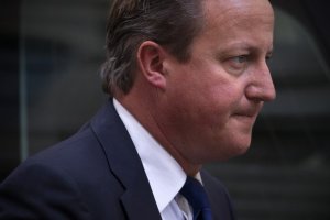 David Cameron arrives at 10 Downing Street in London …
