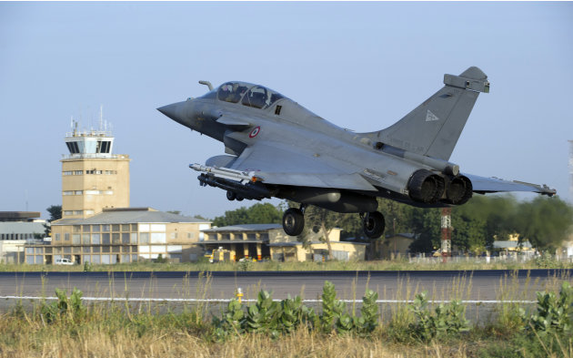 This Sunday Jan.13, 2013 photo provided by the French Army Monday Jan.14, 2013 shows a  French Rafale jetfighter landing after a mission to Mali in N'Djamena, Chad. French fighter jets bombed rebel ta