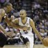 San Antonio Spurs' Tony Parker drives as Miami Heat's Chris Bosh defends during the first half at Game 4 of the NBA Finals basketball series, Thursday, June 13, 2013, in San Antonio. (AP Photo/Eric Gay)