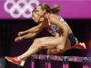 Jessica Ennis of Britain and Hyleas Fountain of the U.S. compete in their women's heptathlon 100m hurdles heat during the London 2012 Olympic Games at the Olympic Stadium