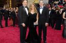 Producers Chris Buck, Jennifer Lee and Peter Del Vecho, best animated feature film nominees for "Frozen" arrive at the 86th Academy Awards in Hollywood