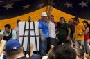Venezuela's opposition candidate Capriles greets supporters during an election rally in Anzoategui