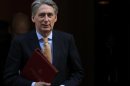 Britain's Defence Secretary Philip Hammond leaves after attending a Cabinet meeting at Number 10 Downing Street in London