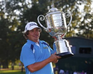 Jason Dufner of the U.S. poses with the Wanamaker trophy after winning the 2013 PGA Championship golf tournament at Oak Hill Country Club in Rochester