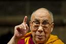 The Dalai Lama, delivers a speech during the Programme of Buddhist Teachings in Mexico City, on October 12, 2011