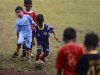 Children attend a training session of the Bogor government soccer school at Pajajaran stadium in Bogor