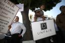 Uber driver Levin protests with other drivers against working conditions, in Santa Monica