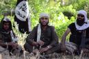 A Jihadist believed to be a 20-year-old man from Cardiff, Wales, speaks in an online jihadist recruitment video on June 19, 2014