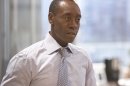 This publicity image released by Showtime shows Don Cheadle in "House of Lies." Cheadle is nominated for an Emmy Award for best actor in a comedy series for his role as Marty Kaan. The Academy of Television Arts & Sciences' Emmy ceremony will be hosted by Neil Patrick Harris. It will air Sept. 22 on CBS. (AP Photo/Showtime, Michael Desmond)
