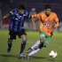Barboza of Uruguay's Liverpool challenges Mejia of Colombia's Envigado during Copa Sudamericana soccer match in Montevideo