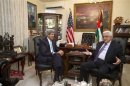 U.S. Secretary of State John Kerry meets with Palestinian President Mahmoud Abbas in Amman