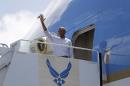President Barack Obama waves as he boards Air Force One at Joint Base Pearl Harbor-Hickam, adjacent to Honolulu, Hawaii, Friday, Sept. 2, 2016, en route to Hangzhou Xiaoshan International Airport, in Hangzhou, China. (AP Photo/Carolyn Kaster)