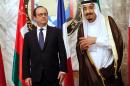 French President Francois Hollande (L) stands beside Saudi Arabia''s King Salman during the the Gulf cooperation council summit in Riyadh on May 5, 2015