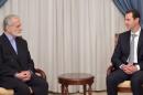 Syria's President Bashar al-Assad meets with Kamal Kharrazi, head of Iran's Strategic Council on Foreign Relations, in Damascus
