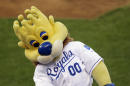 In this Monday, Aug. 24, 2009 photograph, Kansas City Royals mascot "Sluggerrr" throws hot dogs into the crowd during a baseball game against the Cleveland Indians in Kansas City, Mo. The Missouri Supreme Court is weighing whether a legal standard that protects sports teams from being sued over fan injuries caused by in-game events should also apply to those caused by mascots or other team personnel. (AP Photo/Charlie Riedel)