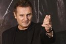 Actor Liam Neeson poses before a news conference to promote his movie, "Taken 2" in Seoul