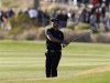 Day of Australia hits his second shot on the 18th hole during the quarterfinal round of the WGC-Accenture Match Play Championship golf tournament in Marana