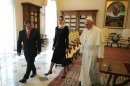 Pope Francis (R) with King Abdullah II (L) and wife Rania after a private audience on August 29, 2013 at the Vatican