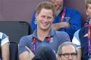 Britain's Prince Harry watches the women's beach volleyball bronze medal match between Brazil and China during the London 2012 Olympic Games