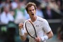 Britain's Andy Murray celebrates breaking serve in the fourth set against Italy's Andreas Seppi during his men's singles third round match on day six of the 2015 Wimbledon Championships in Wimbledon, southwest London, on July 4, 2015