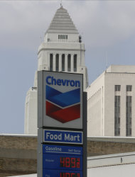 <p> In this Thursday, Apr. 25, 2013, photo, the logo of Chevron is seen at a gas station downtown Los Angeles. Chevron Corp. reports quarterly financial results before the market opens on Friday, Aug. 2, 2013. (AP Photo/Damian Dovarganes)