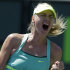 Maria Sharapova, of Russia, reacts after wining the first set against Sara Errani, of Italy, during the quarterfinals of the Sony Open tennis tournament, Wednesday, March 27, 2013, in Key Biscayne, Fla. (AP Photo/Lynne Sladky)