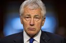 Defense Secretary Chuck Hagel listens prior to testifying on Capitol Hill in Washington, Wednesday, April 17, 2013, before the Senate Armed Services Committee hearing on the Pentagon's budget for fiscal 2014 and beyond. (AP Photo/J. Scott Applewhite)