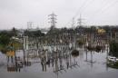 A view of a partially submerged power sub-station is seen in a flood-affected area in Chennai