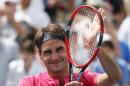 Roger Federer, of Switzerland, acknowledges the crowd after defeating Novak Djokovic, of Serbia, in the men's final the Western & Southern Open tennis tournament, Sunday, Aug. 23, 2015, in Mason, Ohio. Federer won 7-6 (1), 6-3. (AP Photo/John Minchillo)