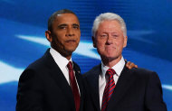 Former U.S. President Bill Clinton stands with Democratic presidential candidate, U.S. President Barack Obama (L) on stage during day two of the Democratic National Convention at Time Warner Cable Arena on September 5, 2012 in Charlotte, North Carolina. (Photo by Chip Somodevilla/Getty Images)