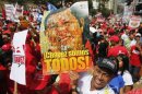 Supporters of Venezuela's President Chavez attend a rally to commemorate 55th anniversary of last Venezuelan dictatorship collapse, in Caracas