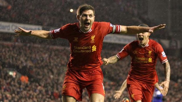 Liverpool's Steven Gerrard celebrates scoring the first goal of the game with a header