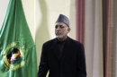 Afghan President Hamid Karzai addesses military officers in Kabul, Afghanistan, Saturday, Feb. 16, 2013. Afghan President Hamid Karzai said Saturday he plans to issue a decree banning Afghan security forces from asking international troops to carry out airstrikes under ``any circumstances.