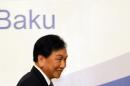 AIBA President Wu Ching-Kuo arrives for a news conference in Baku
