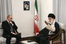 Vladimir Putin (left) meets Ayatollah Ali Khamenei in Tehran on October 16, 2007